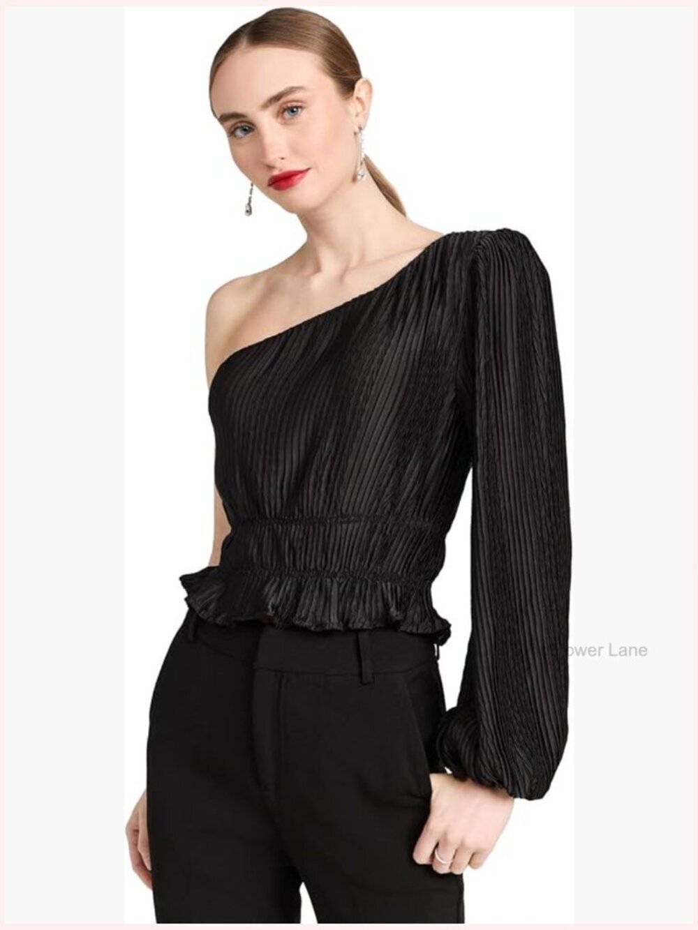 Structured crop top with one shoulder and ruffle details